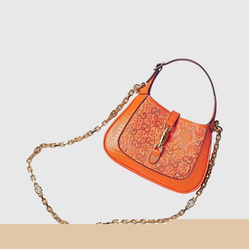 G*u*i top handle bags